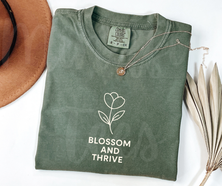 "Blossom And Thrive" Funny Plant Lover Tee Design Unisex heavyweight t-shirt