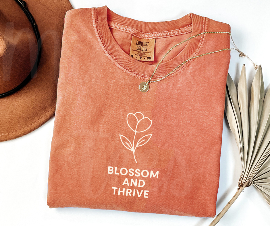 "Blossom And Thrive" Funny Plant Lover Tee Design Unisex heavyweight t-shirt